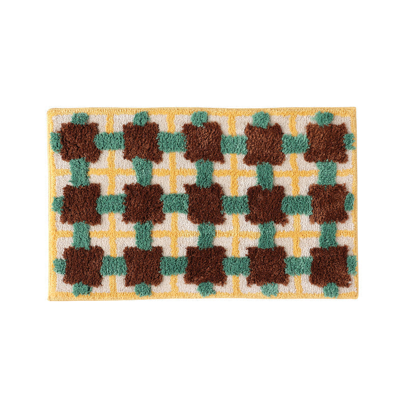 Hand-tufted bathroom bath mat with non-slip backing and textured square relief LoungeYard — product view 5