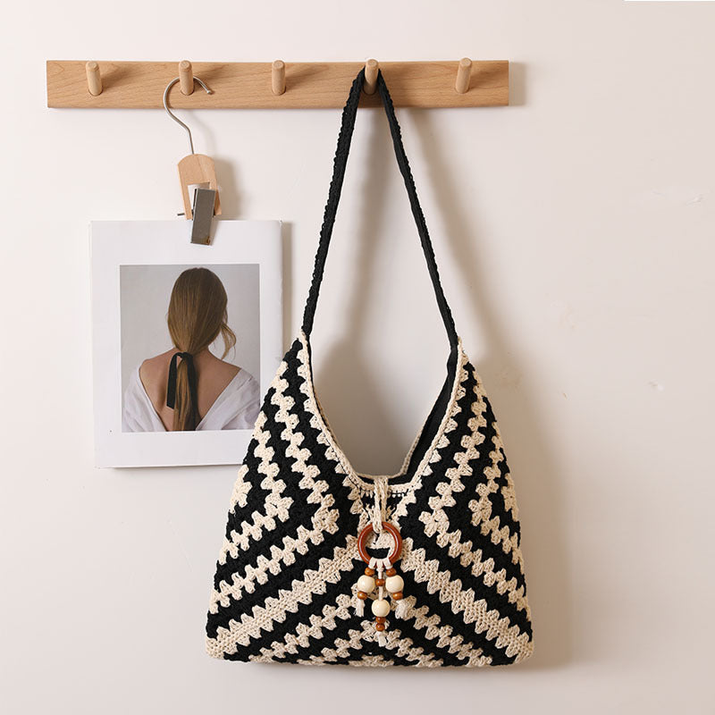 Handmade macrame shoulder bag with playful pendant LoungeYard — product view 6