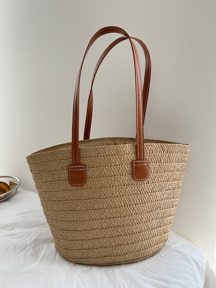 Handcrafted straw bag with elegant leather handles LoungeYard — product view 6