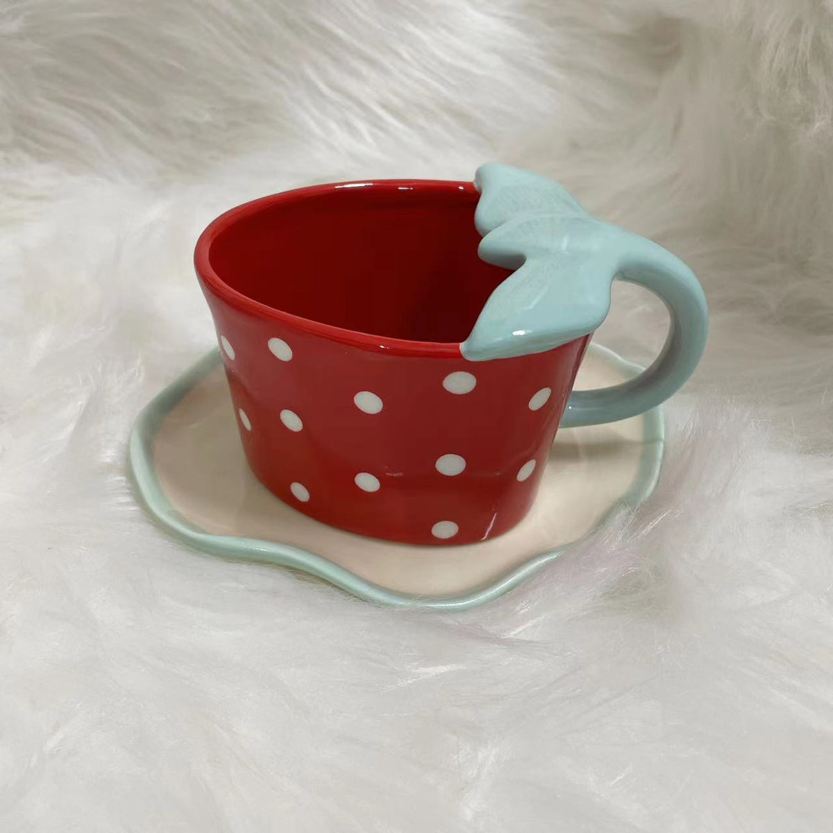 Playful ceramic mug with shaped leaf handle, saucer, and tulip spoon — product view 5