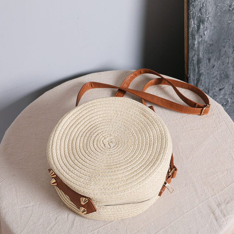 Round shoulder bag made of natural material with stylish accents LoungeYard — product view 6