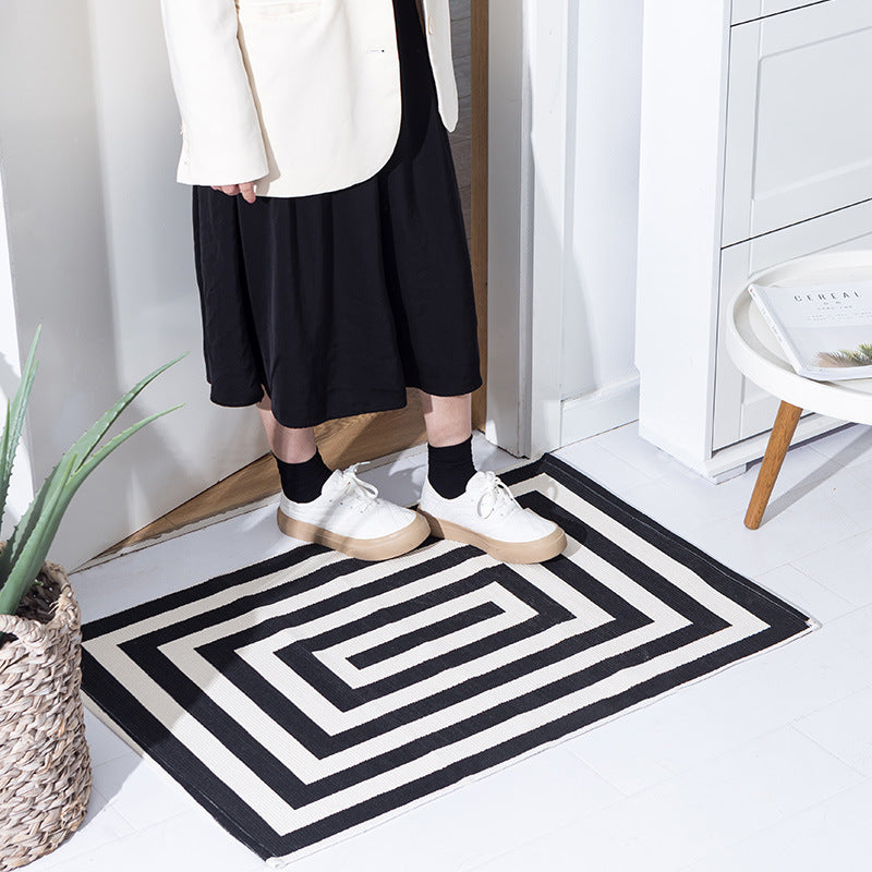 Woven cotton blend bath mat in buffalo check with flat weave structure LoungeYard — product view 4