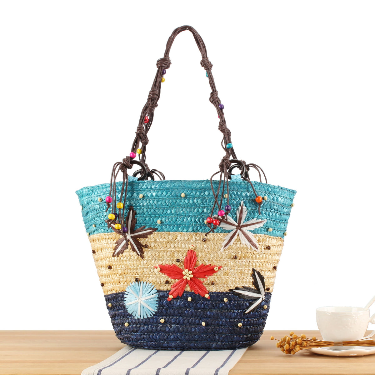 Handcrafted beach bag with cheerful floral patterns LoungeYard — product view 6