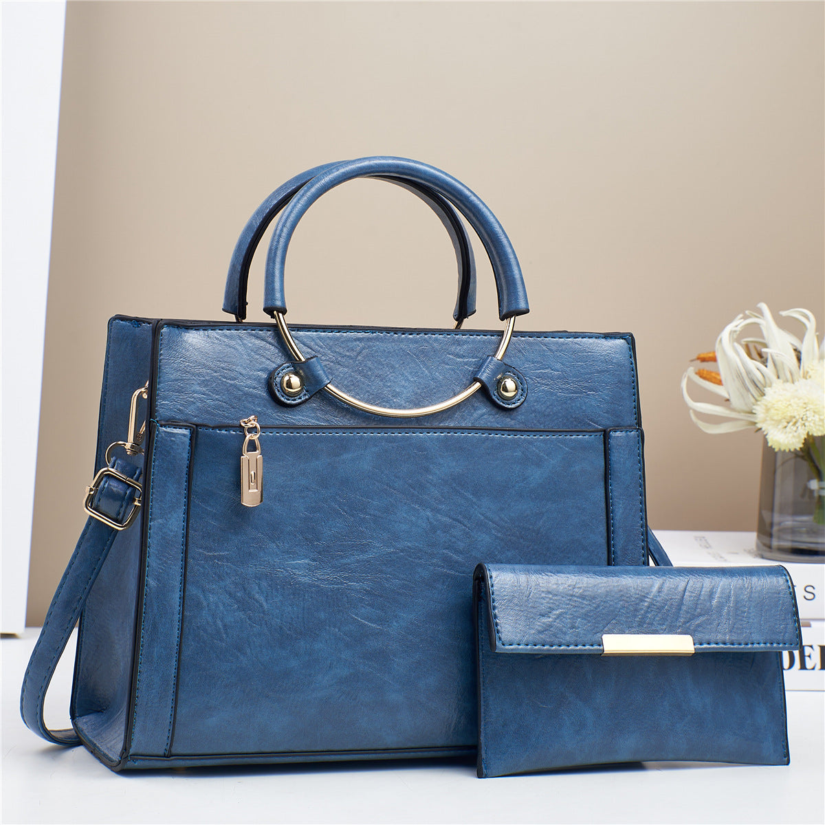 Elegant handbag with detachable shoulder strap and matching wallet LoungeYard — product view 2
