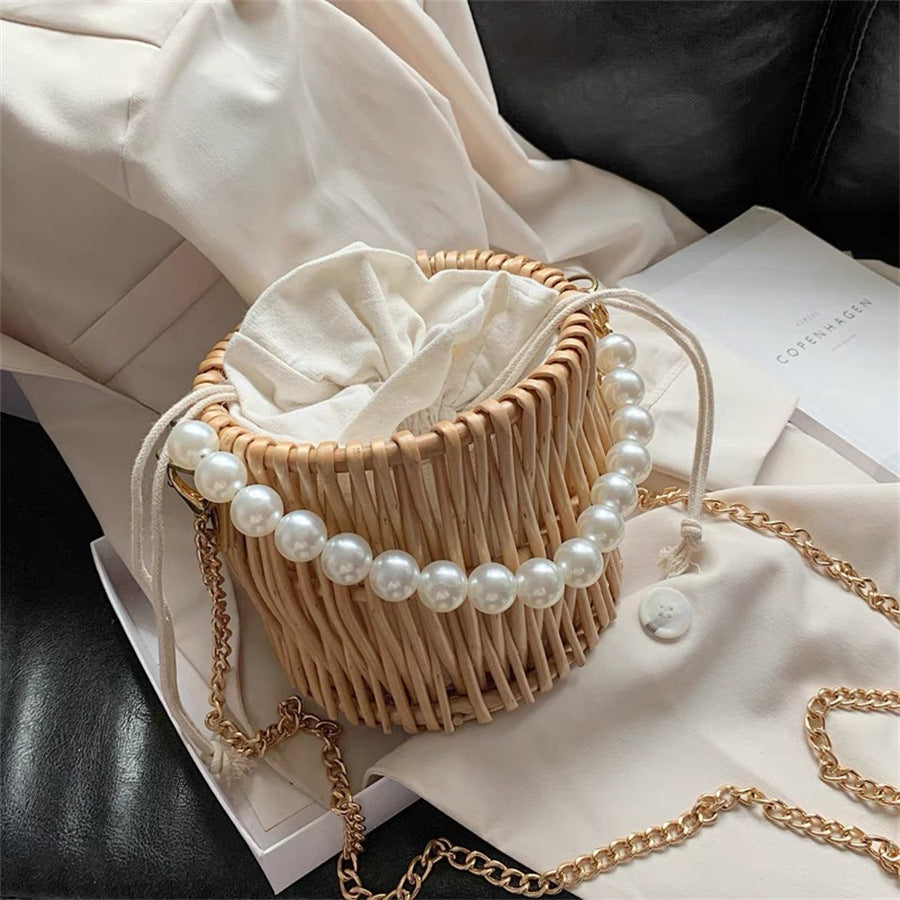 Women’s handbag with elegant pearl handle and braided design LoungeYard — product view 6