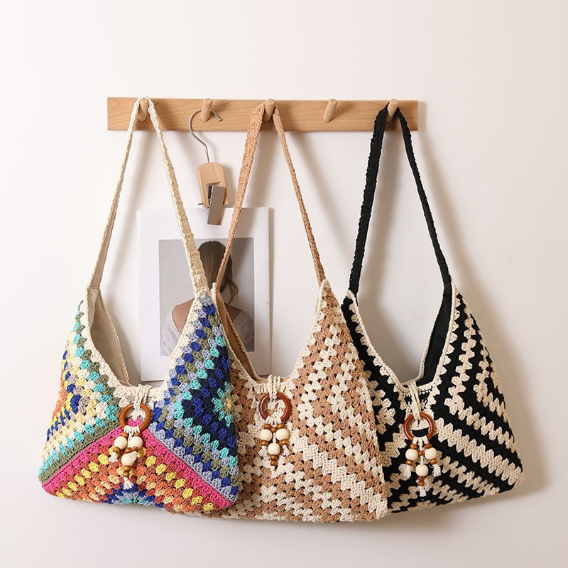 Handmade macrame shoulder bag with playful pendant LoungeYard — product view 2