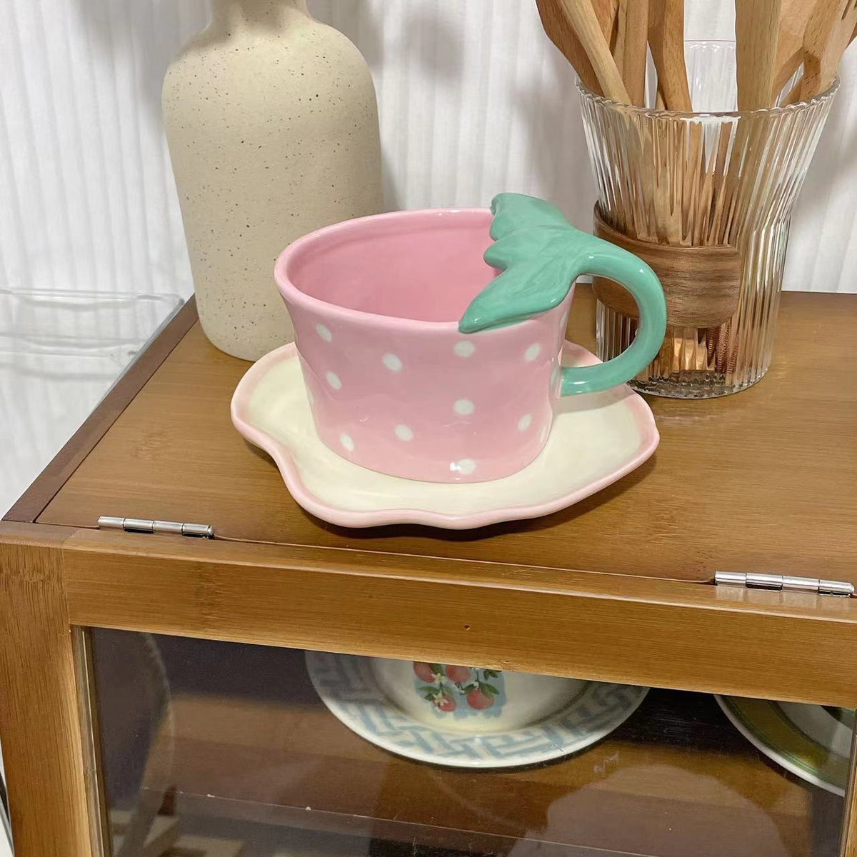 Playful ceramic mug with shaped leaf handle, saucer, and tulip spoon — product view 3