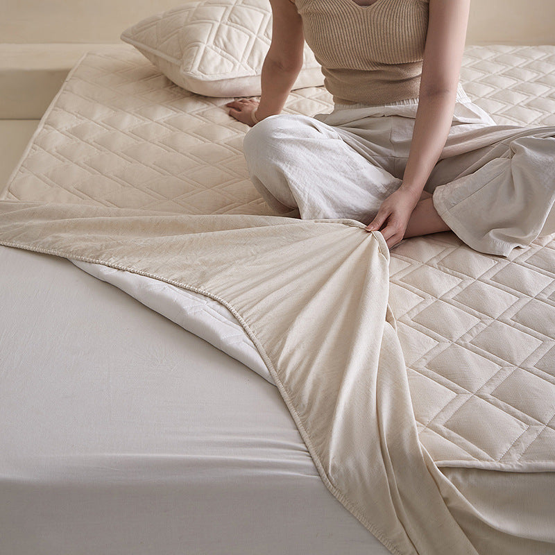 Quilted mattress protector with all-around elastic and breathable cotton filling — product view 3