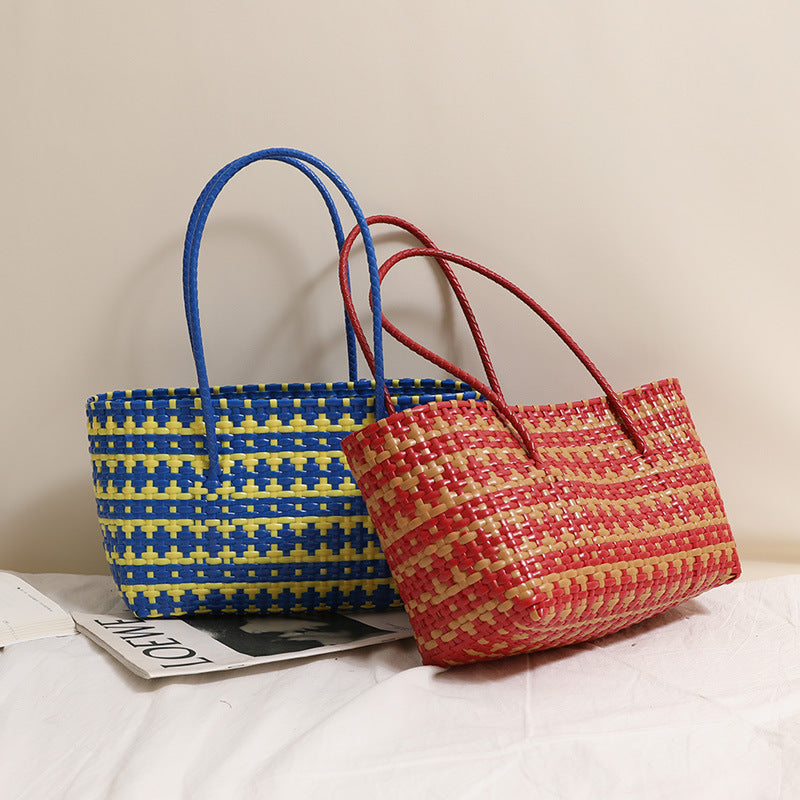 Braided straw bag with color-contrasting stripes LoungeYard — product view 1