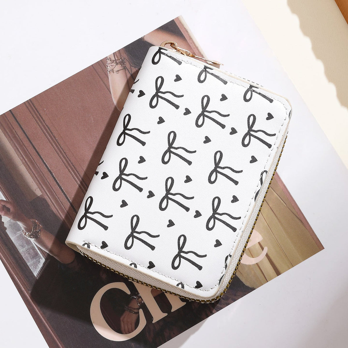 Playful Bow-Patterned Zippered Wallet — product view 1