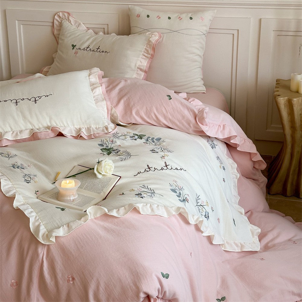 Bedding set with ruffles, embroidered middle cover and delicate flower application — product view 1