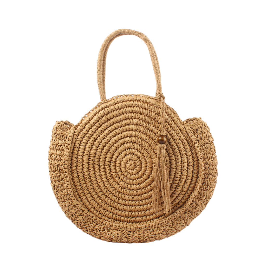 Round basket bag with elegant tassel LoungeYard — product view 1