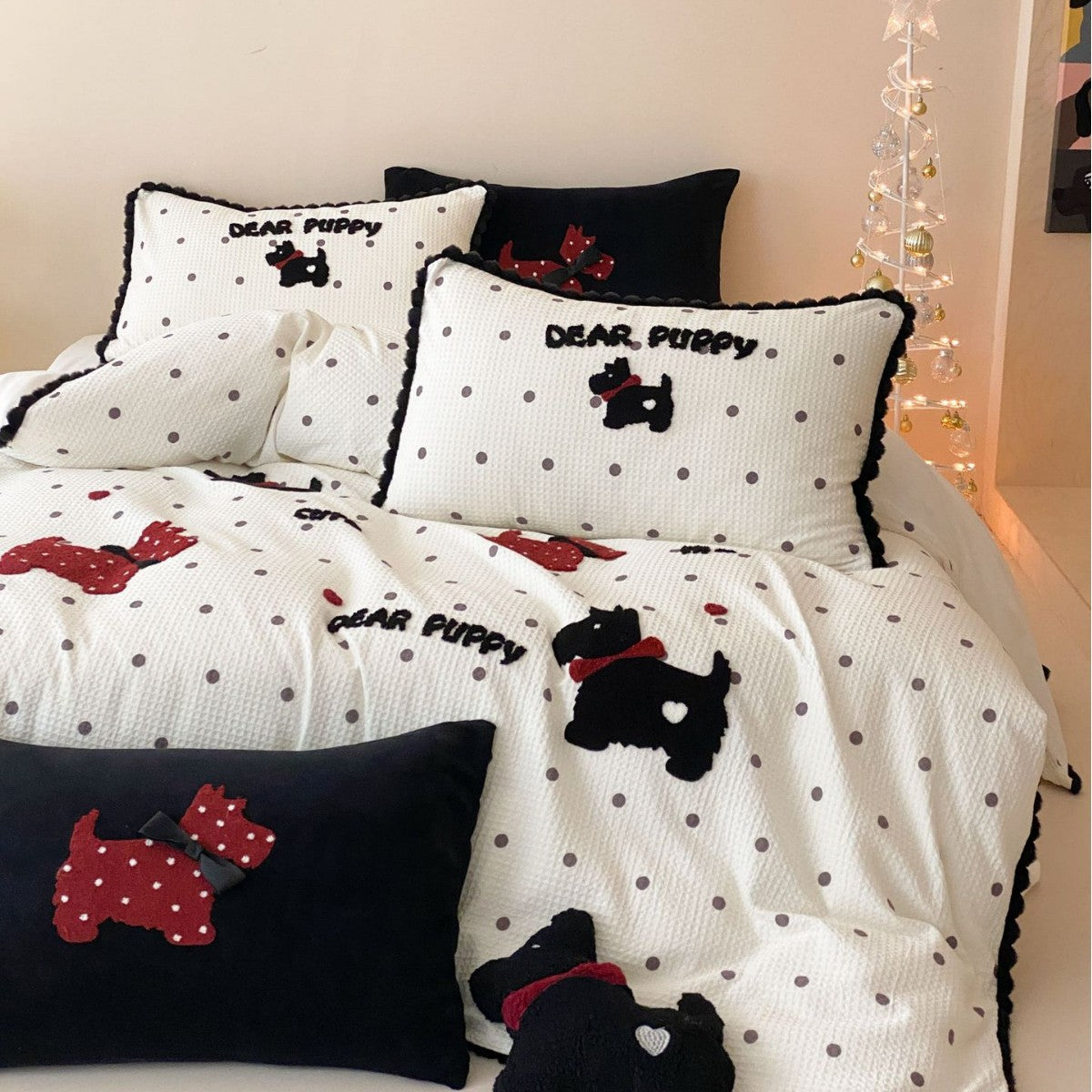 Quilted bedspread and pillow set with embroidered puppy motifs — product view 1