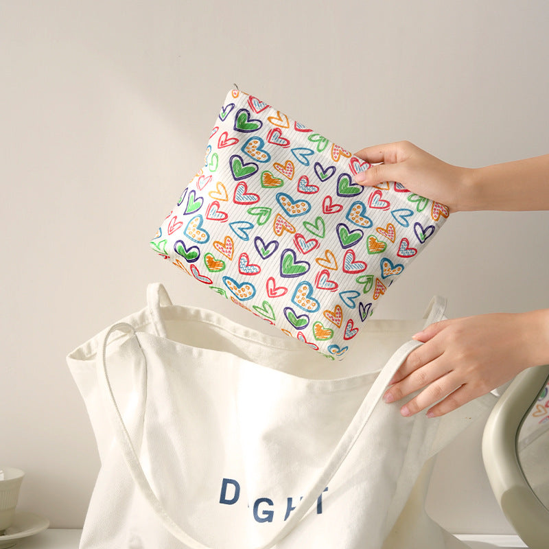 Playful Bow-Patterned Makeup Pouch LoungeYard — product view 1