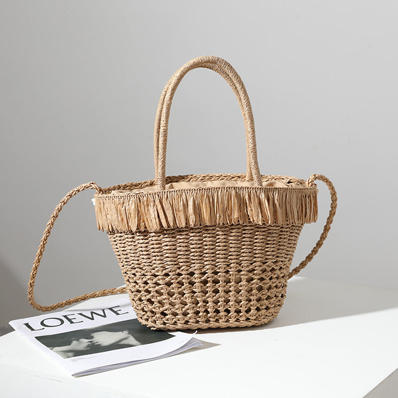 Braided straw bag with decorative tassel detail LoungeYard — product view 3