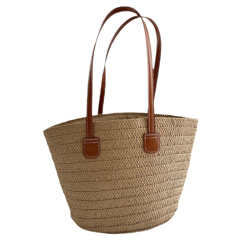 Handcrafted straw bag with elegant leather handles LoungeYard — product view 5