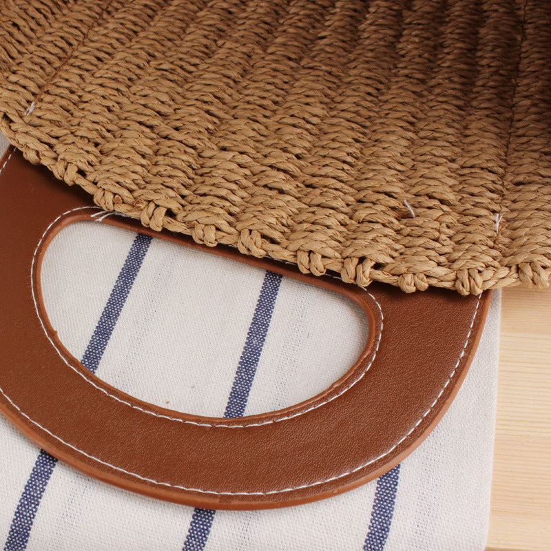 Natural raffia tote bag with elegant leather accents LoungeYard — product view 2
