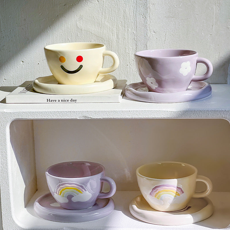Handcrafted ceramic mug and plate set with cheerful smiley relief and organic shape — product view 4