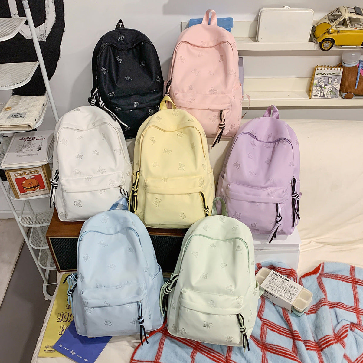 Fashionable backpack with shimmering butterfly design LoungeYard — product view 3