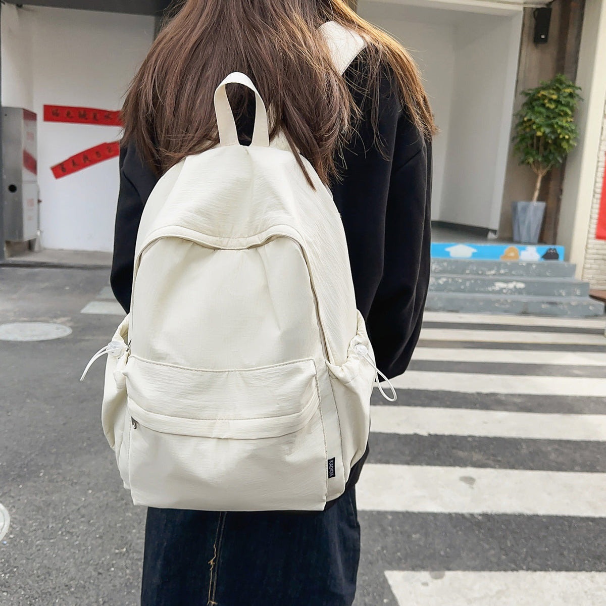 Sporty backpack with practical side pockets LoungeYard — product view 1