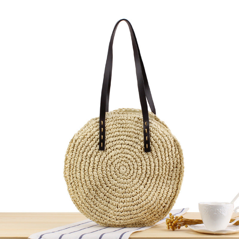 Round basket bag with sturdy leather handles LoungeYard — product view 1