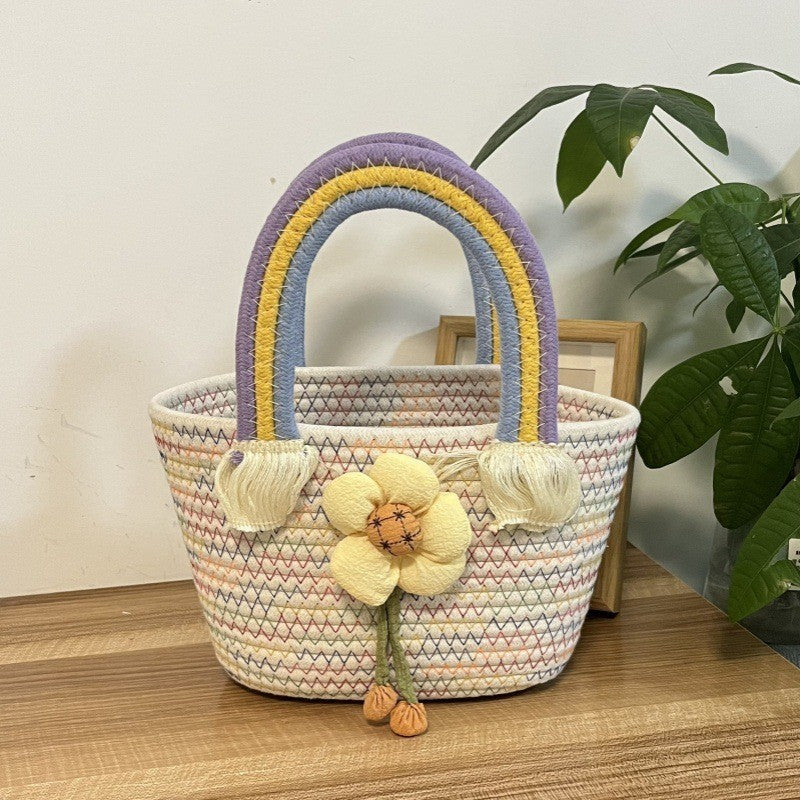 Women's handmade basket bag with color-coordinated handle accents LoungeYard — product view 1