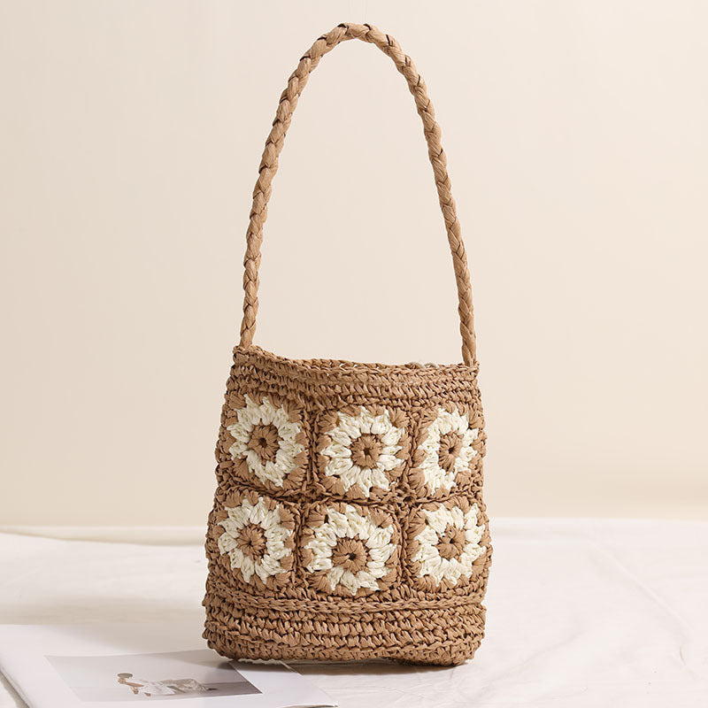 Handcrafted straw bag with floral patterns LoungeYard — product view 1