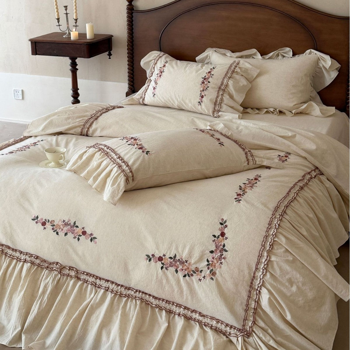 Romantic bedding set with ruffles and floral embroidery in linen look — product view 1
