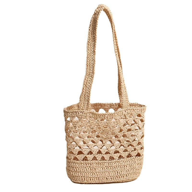 Handcrafted net straw bag with elegant straps LoungeYard — product view 4