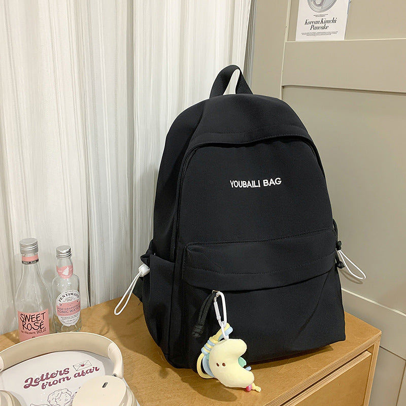 Lightweight Casual Backpack with Decorative Keychain LoungeYard — product view 6
