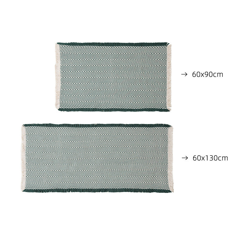 Handwoven cotton bath mat with herringbone pattern and fringes LoungeYard — product view 7