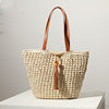 Handcrafted basket bag with fashionable tassel detail LoungeYard — product view 7