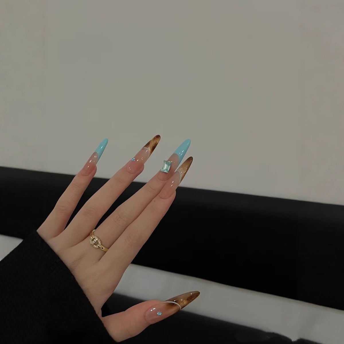 Elegant Stiletto Nail Extensions with Glitter Accents — product view 1