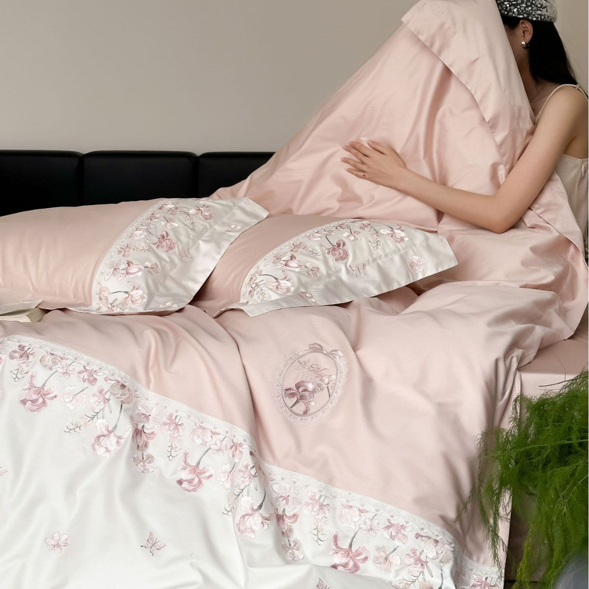Luxurious satin bedding set with floral stitched border — product view 1