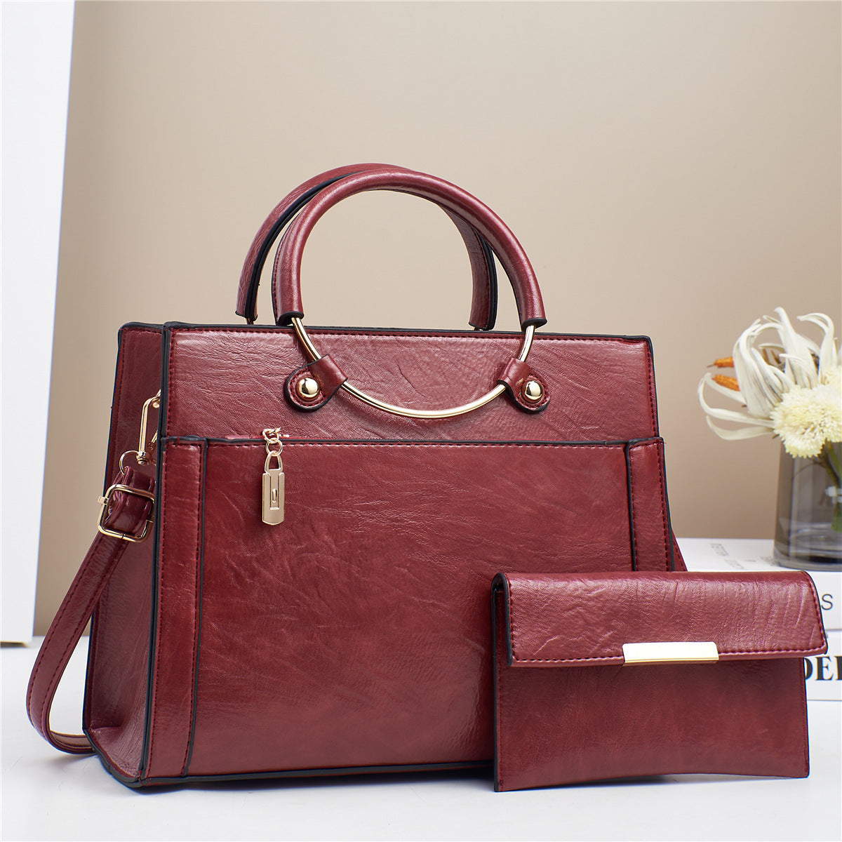 Elegant handbag with detachable shoulder strap and matching wallet LoungeYard — product view 3