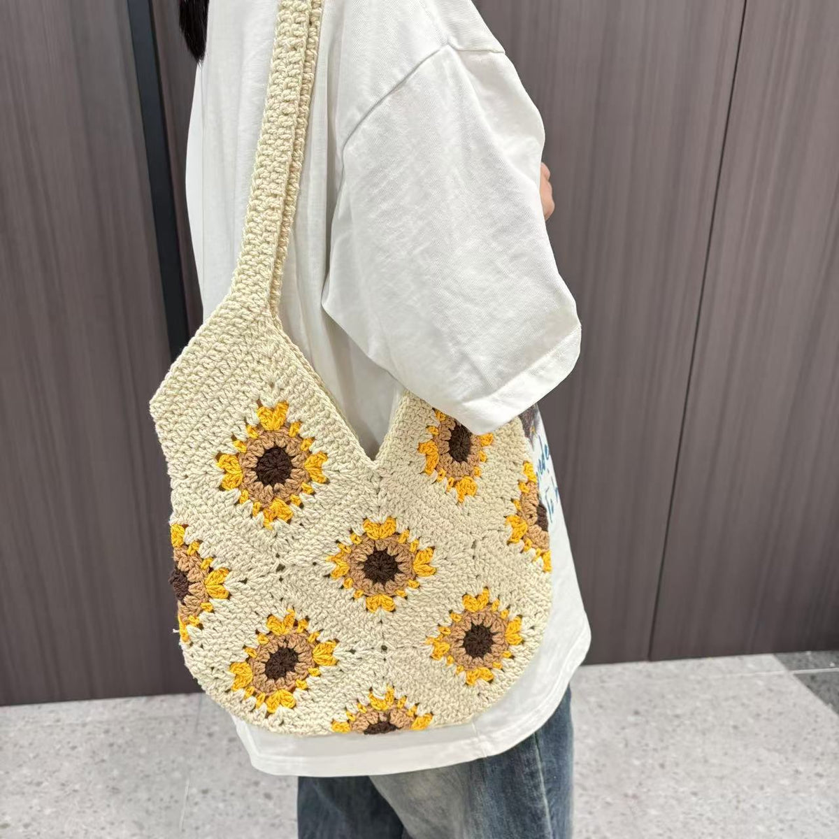 Hand-knotted shoulder bag with sunflower motif LoungeYard — product view 2