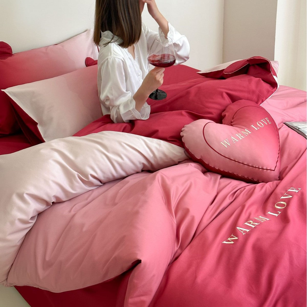 Reversible cotton satin bedding set with heart appliqué and embroidery motif LoungeYard — product view 3