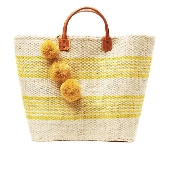 Stylish basket bag with playful pompons LoungeYard — product view 3