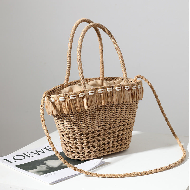 Braided straw bag with decorative tassel detail LoungeYard — product view 2