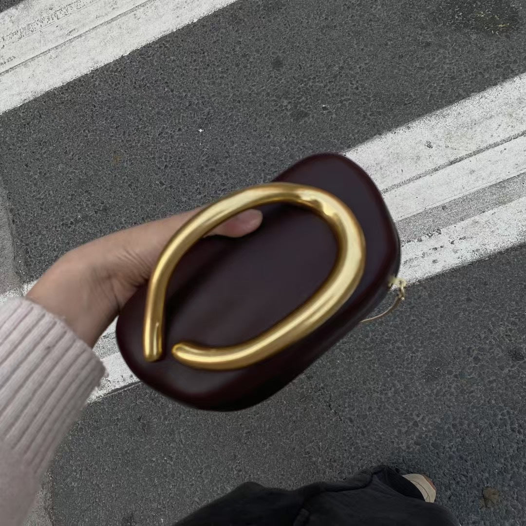 Statement Clutch with Sculptural Handle LoungeYard — product view 1
