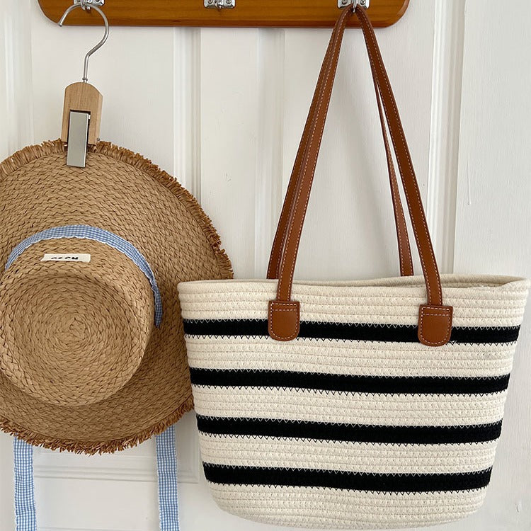 Stylish straw bag with contrasting stripes LoungeYard — product view 1