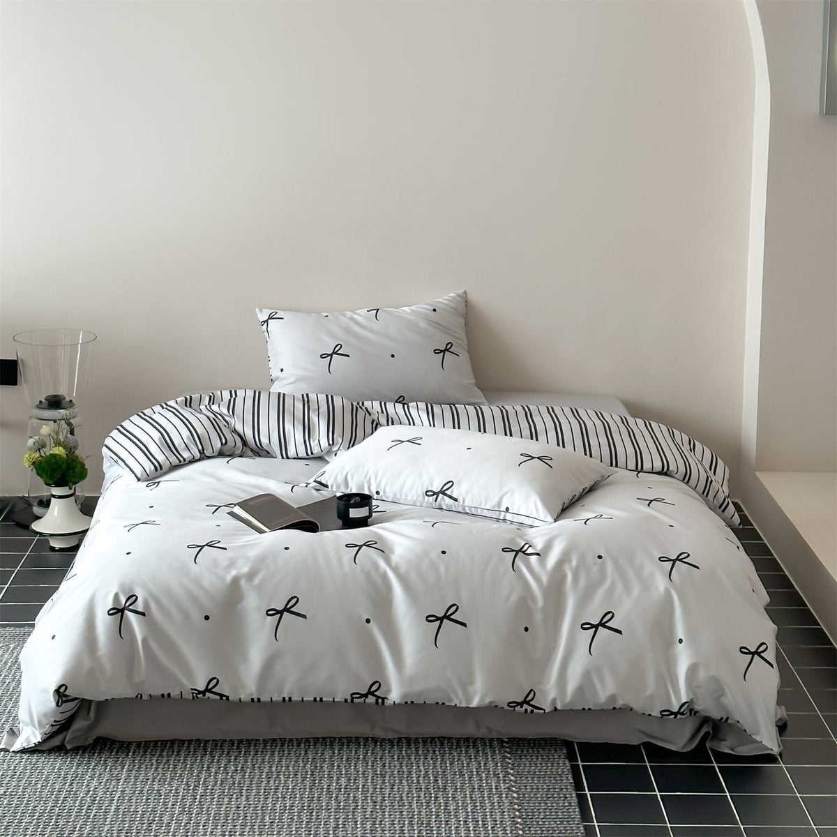 Modern cotton bedding set with minimal bow print and striped reversible side — product view 6