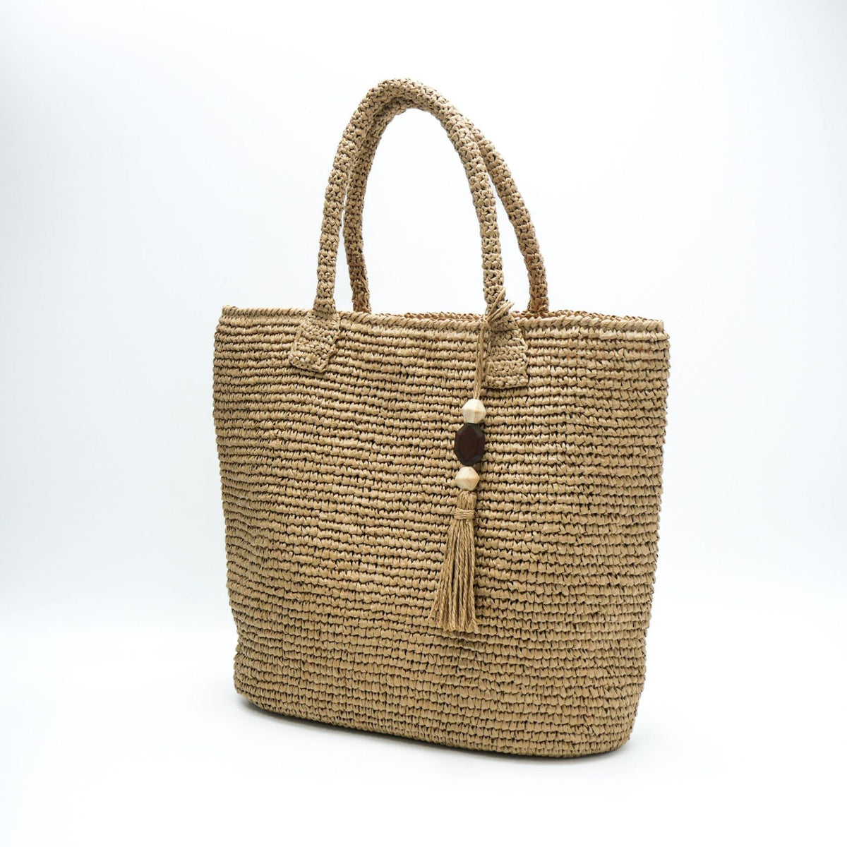 Handmade basket bag with unique fringe pendant LoungeYard — product view 2