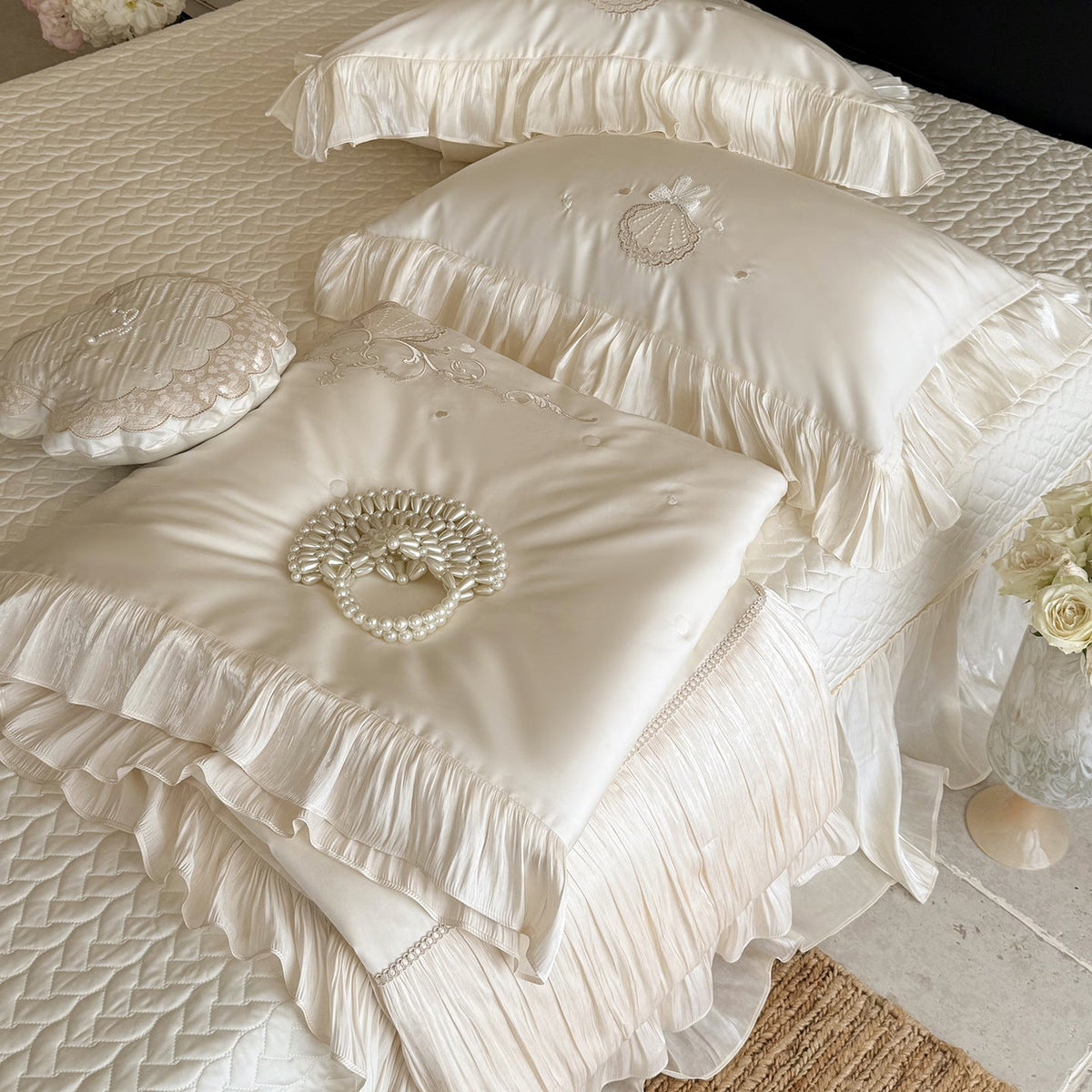 Elegant embroidered satin bedding set with frill pillow and quilted bedspread LoungeYard — product view 3