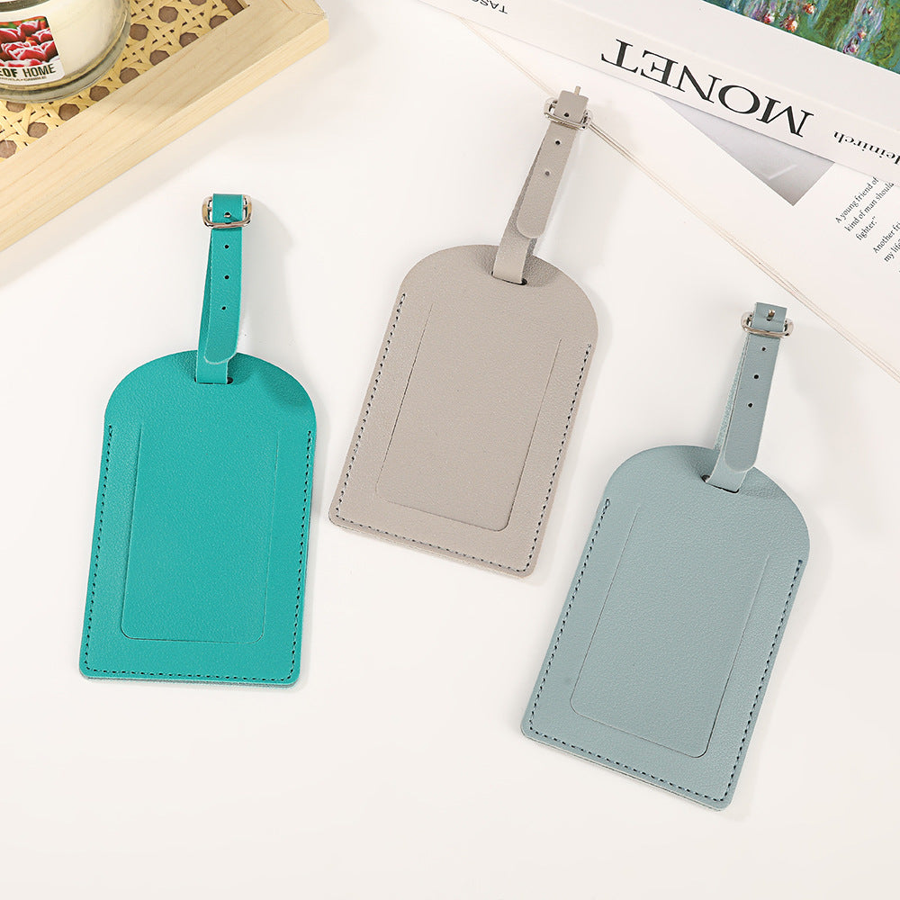 premium vegan leather luggage tag with adjustable buckle and clear ID window LoungeYard — product view 1