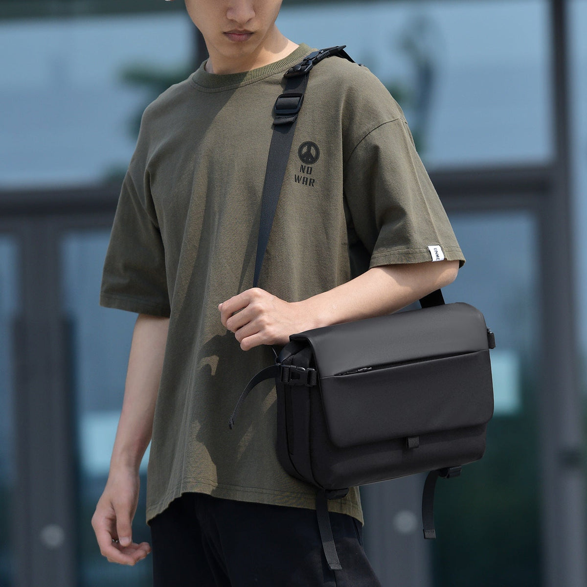 Messenger bag with versatile compartments and water-repellent material LoungeYard — product view 1