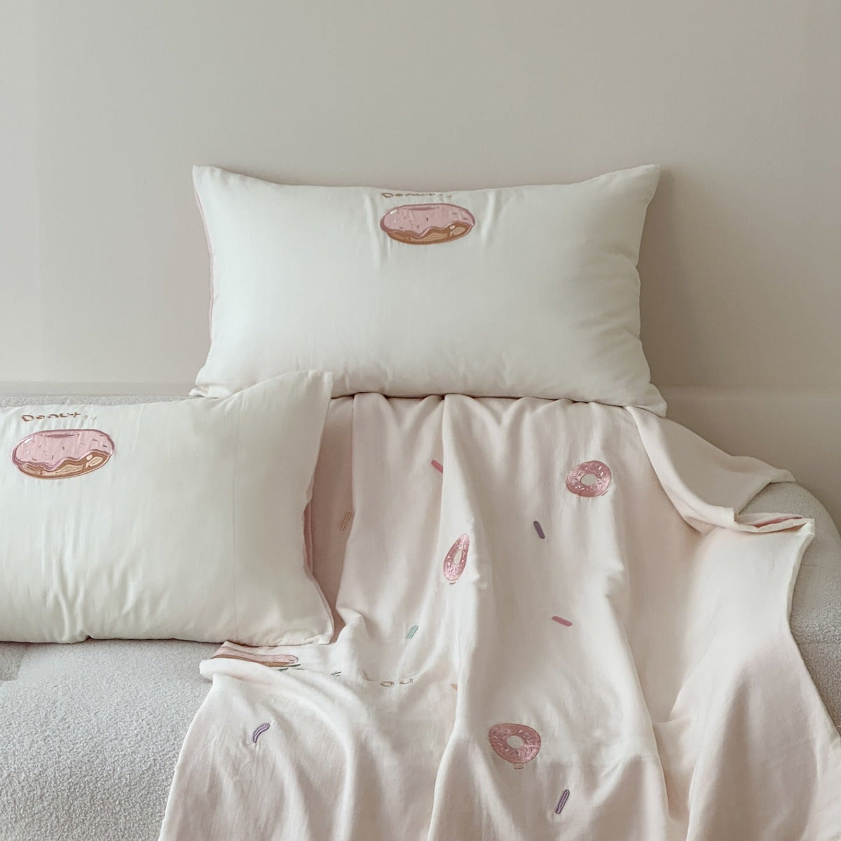 Cotton bedding set with embroidered donut motif and pillowcases LoungeYard — product view 3