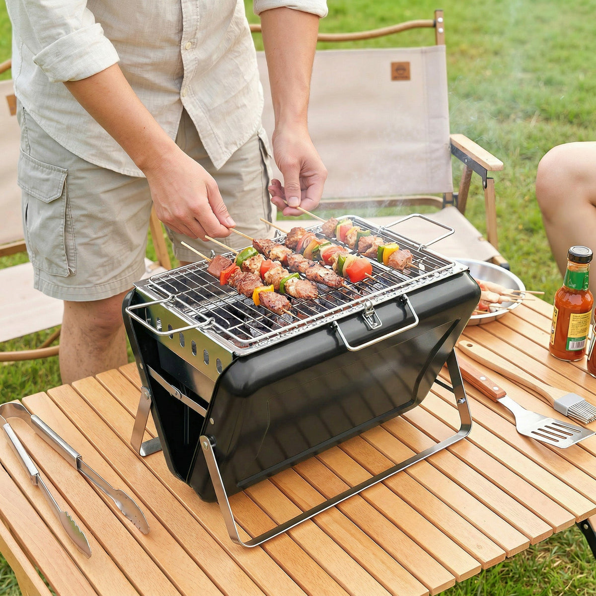 Folding Portable Charcoal BBQ Grill with Handle and Foldable Legs, Black — product view 4