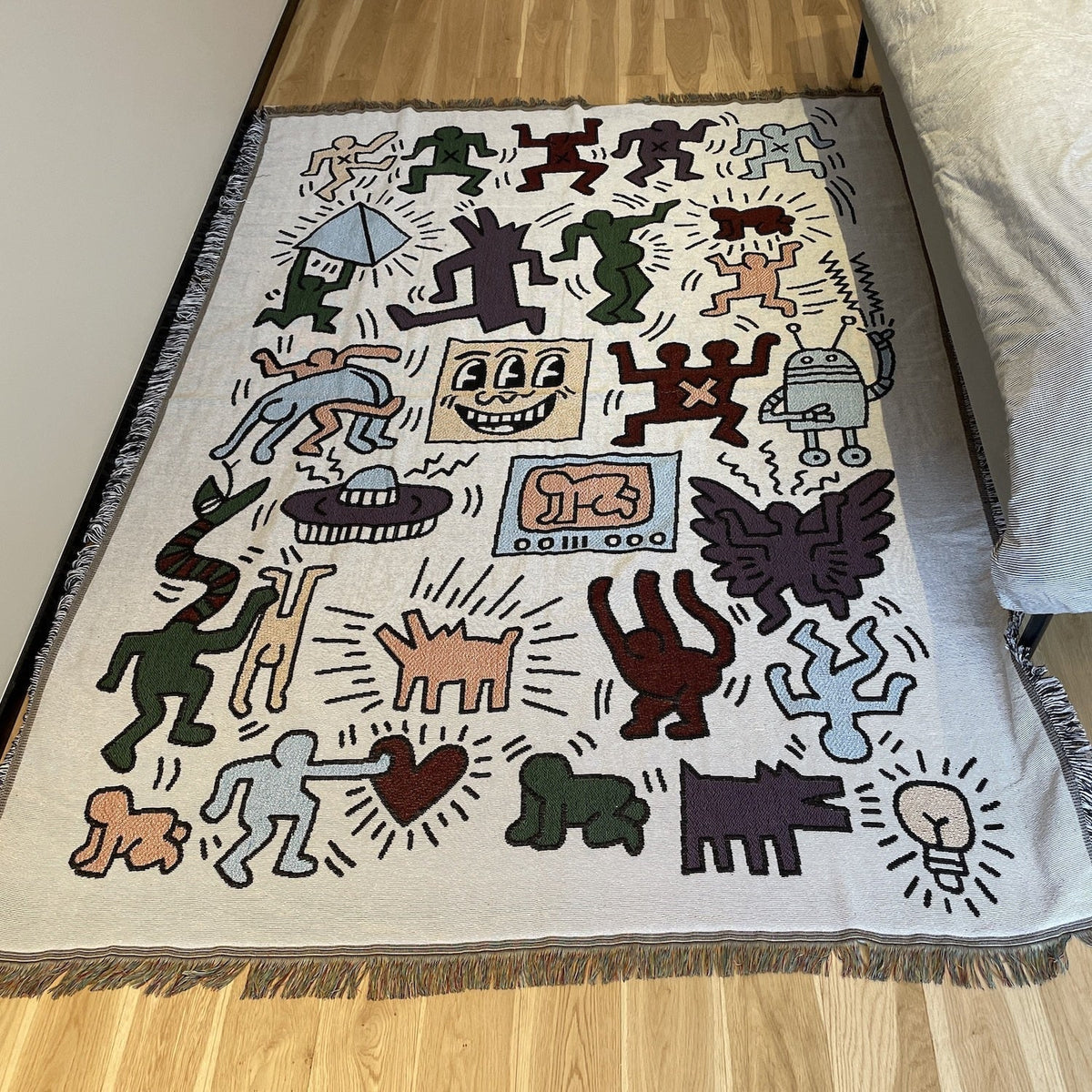Keith Haring Puzzle Throw Blanket with Jacquard Pattern — product view 1