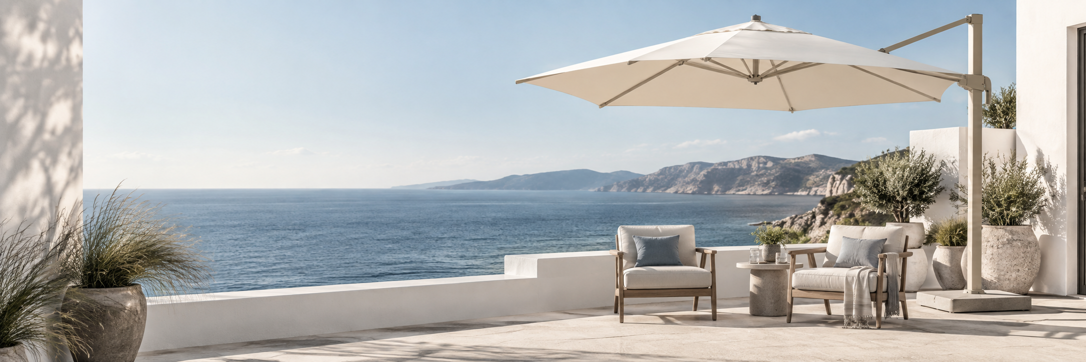 Umbrella and outdoor seating on a sea-view terrace
